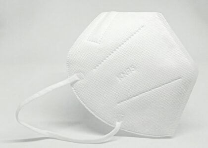 white round plastic container on white table