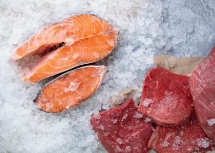 a pile of fish sitting on top of a pile of ice