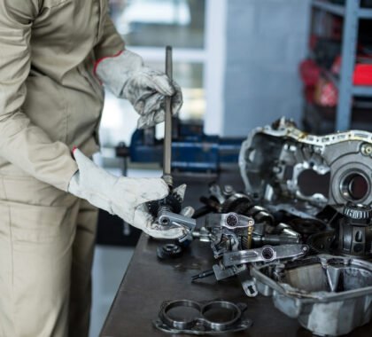 mechanic checking car parts 1