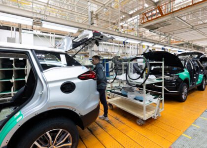 minsk belarus dec 15 2021 car bodies are assembly line factory production cars modern automotive industry electric car factory conveyor